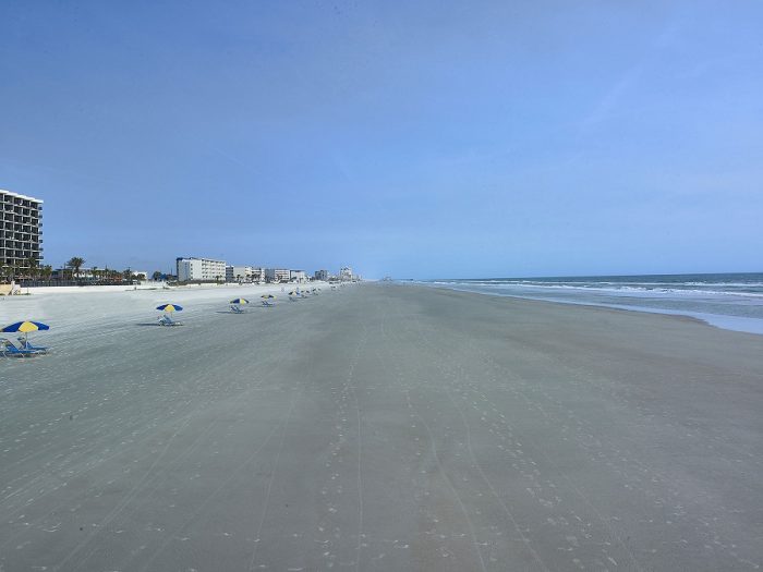 Holiday Inn Resort Daytona Beach walking on Beach